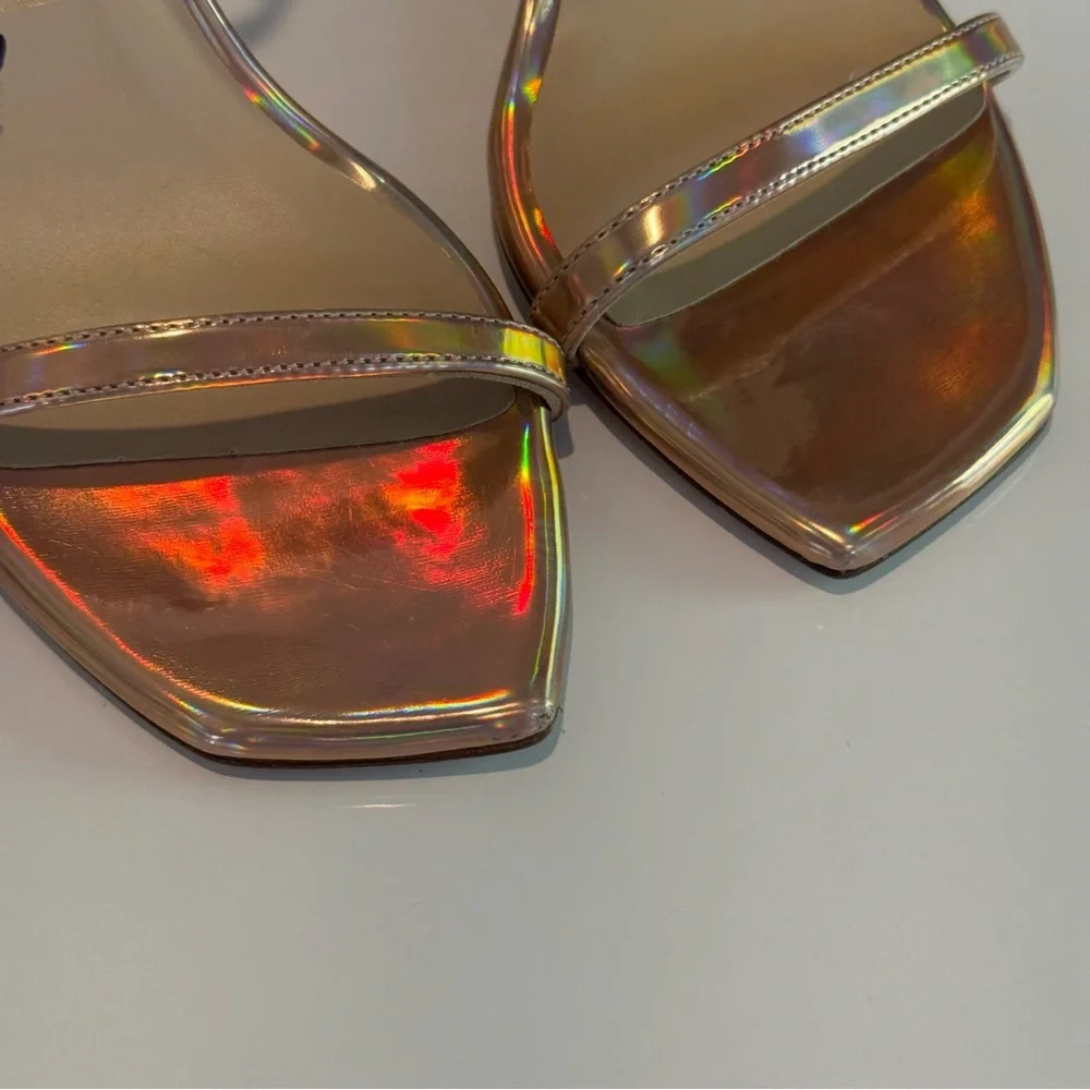 Stuart Weitzman Nudistcurve 100 Ankle Strap Heel Rose Gold Metallic Hologram